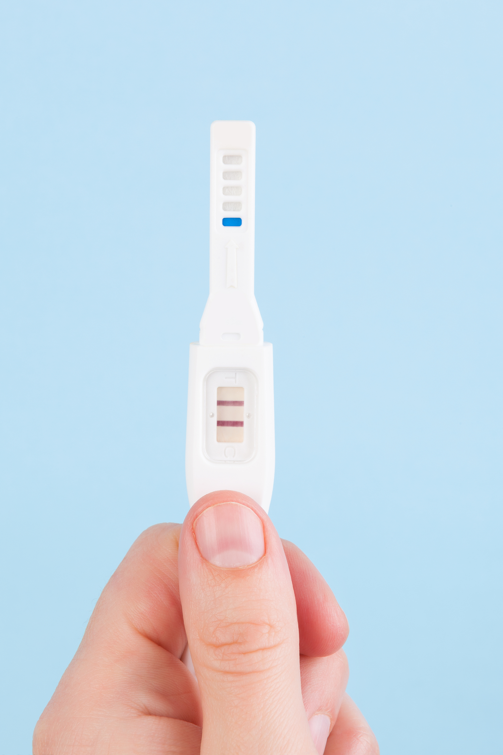 Home holding pregnancy test